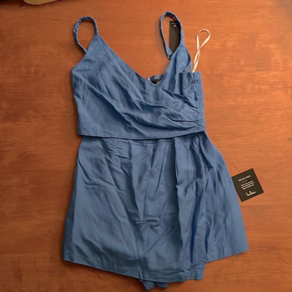 Lulus NWT faux wrap romper. Lovely blue and size small